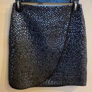 Women’s faux wrap metallic/ foil black mini skirt. NWOT. LOFT size 4 shimmer